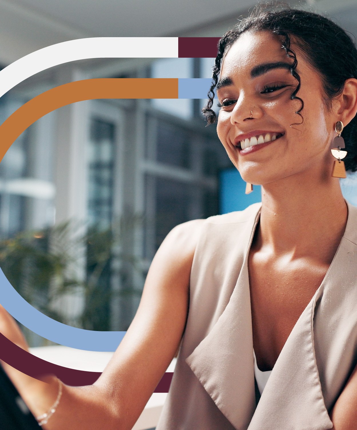 Smiling woman at work, framed by sweeping white lines
